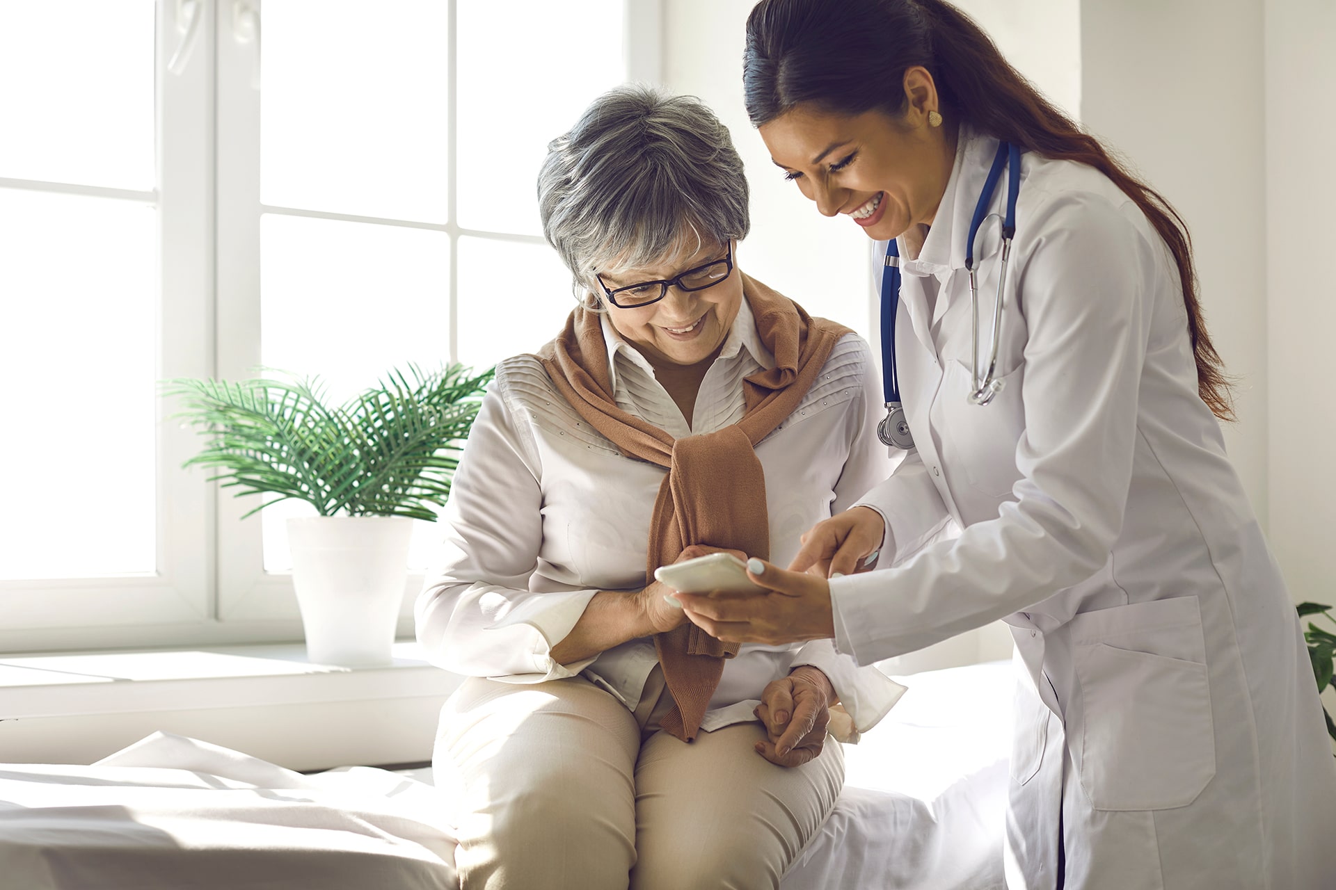 Female doctor helping Patient